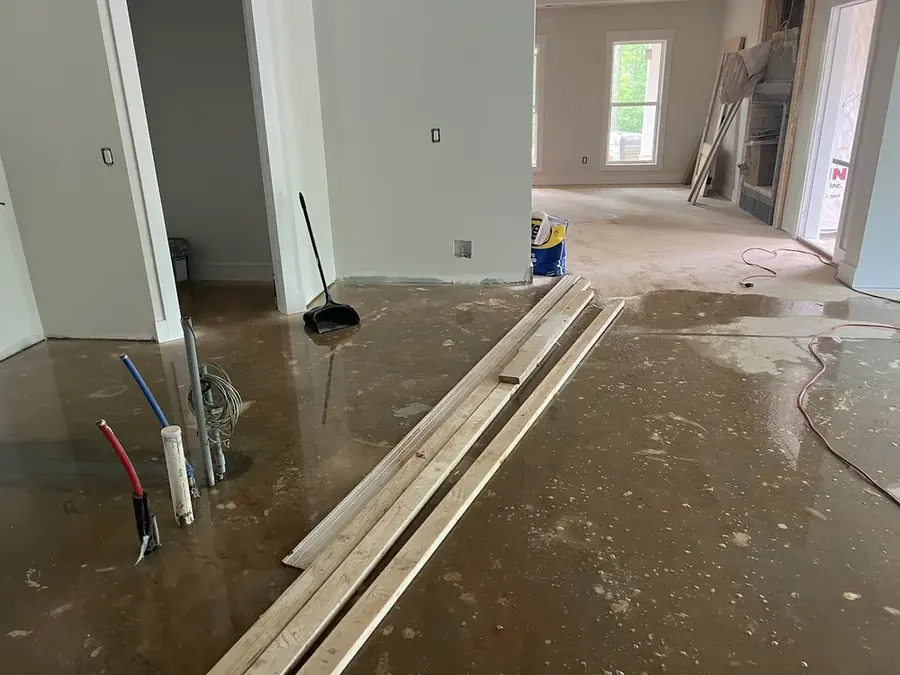 Burst water supply line spraying inside a Cary home