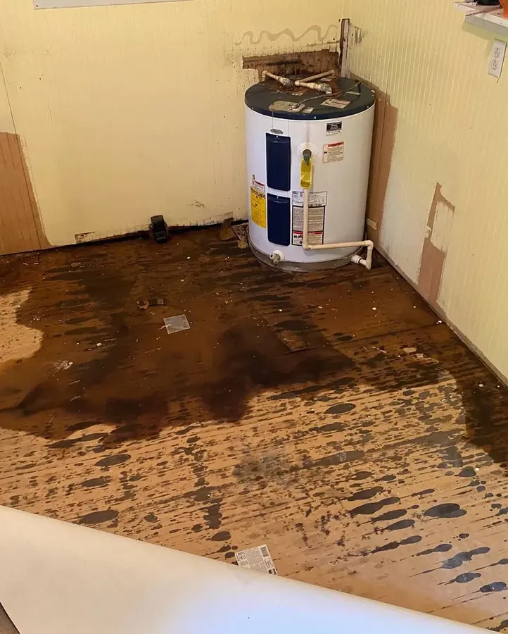 Water heater flood in a Cary utility closet